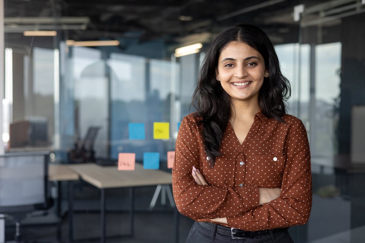Confident Indian urban woman smiling